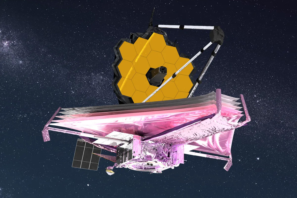 This artist’s rendering shows the James Webb Space Telescope and its five-layer sun shield [in pink and purple here], which keeps the instrument forever in the shade. This is also, therefore, not how the JWST would actually look in a photograph, as the mirrors and mirror assemblies are by design always shrouded in darkness. Northrop Grumman/NASA