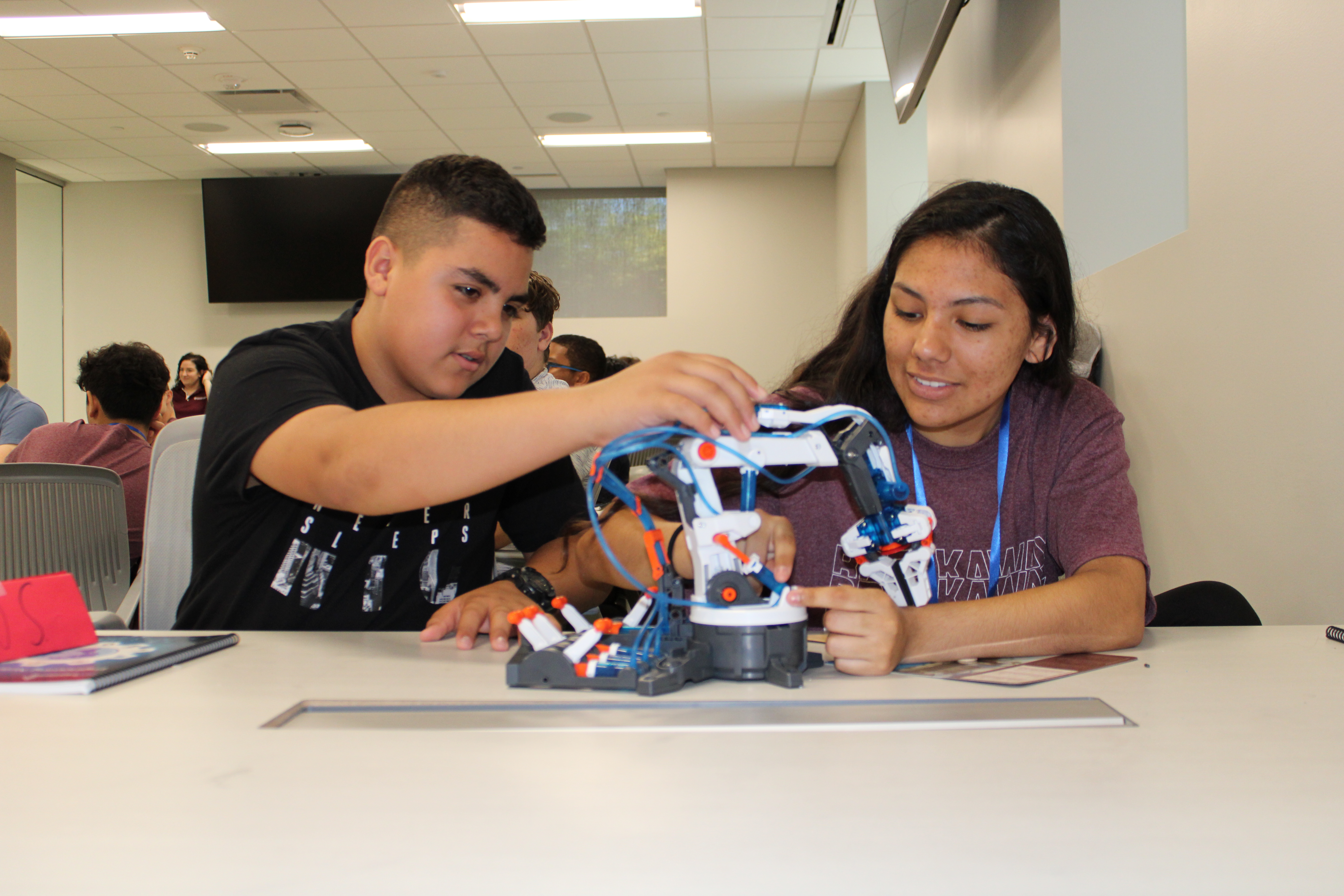 IEEE TryEngineering Summer Institute students collaborating on a project.